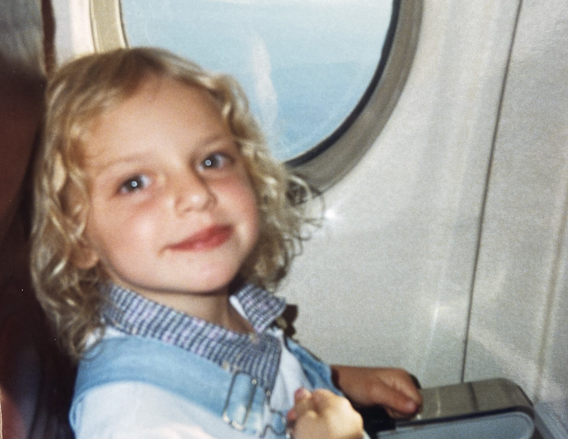 Little Chelcie on an airplane to Spokane