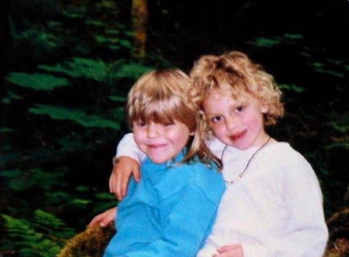 Holly and Chelcie hugging on a hike 
